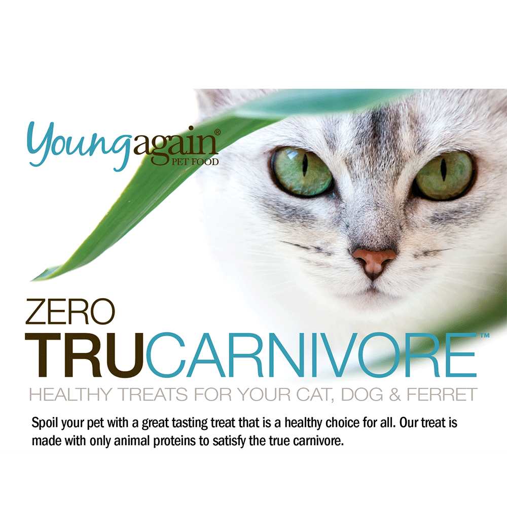 A close-up of a cat's face is featured above the text: Young Again Pet Food. Zero TRU Carnivore. Healthy treats for your cat, dog & ferret. The package promotes animal-based treats for pets.
